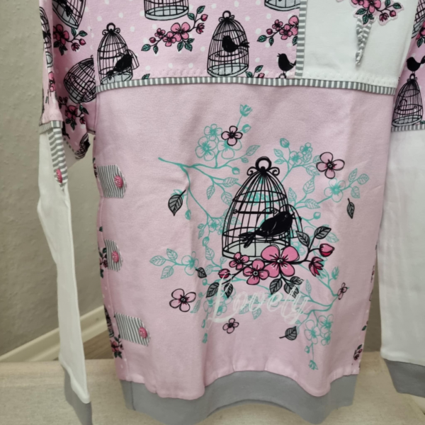 Gr. 134 Sweater Detail Vogelkäfig